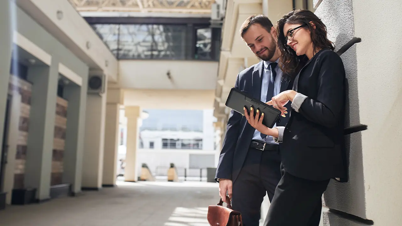 An Aelia Care partner coordinating travel support for a hotel guest.